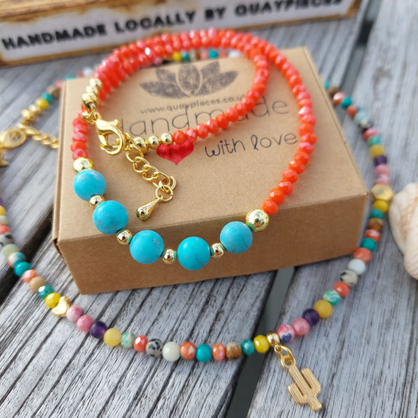 <p><span data-mce-fragment="1">Gorgeous delicate colourful necklace to brighten up your outfit!</span></p> <p><span data-mce-fragment="1">4mm saffron orange faceted beads with gold plated &amp; 8mm turquoise beads&nbsp;</span></p> <p><span data-mce-fragment="1">Gold plated fastenings with lobster clasp &amp; star charm&nbsp;</span></p> <p><span data-mce-fragment="1">Length - 39cm with extension chain to 43cm</span></p>