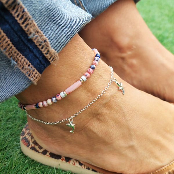 ﻿925 Hall marked Sterling Silver  Sterling Silver recycled trace chain Anklet with cute starfish & dolphin charms  One length available - 24cm  Perfect to stack with beaded anklets or alone for a beachy look!  ﻿**Presented in lovely Kraft paper gift box with reusable organza pouch**
