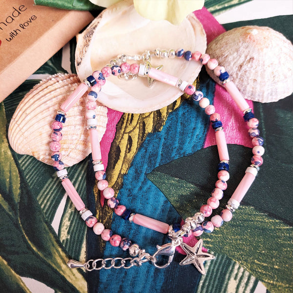 ﻿Super cute beach anklet, handmade with pink & blue marble effect natural stone beads, s silver hematite & stone discs with pink shell tubes.  Each anklet has sterling silver plated fastenings, lobster clasp & starfish (nickel free) charm  Length - 24cm extends to 27cm  Perfect gift for any surf chick!  **Presented in lovely Kraft paper gift box with reusable organza pouch**   **To keep your quaypieces looking great, always take me off before showering or swimming.