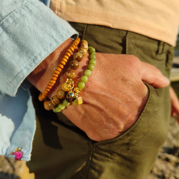 Lovely 6mm Matt Natural Serpentine Stone Bead Bracelet in olive green with Gold plated cube charm  Elasticated, so will fit most adult wrists (measuring 71/2 in/19cm)  Perfect for wearing with those Winter outfits & a lovely gift for friends or family  **Presented in lovely Kraft paper gift box with reusable organza pouch**