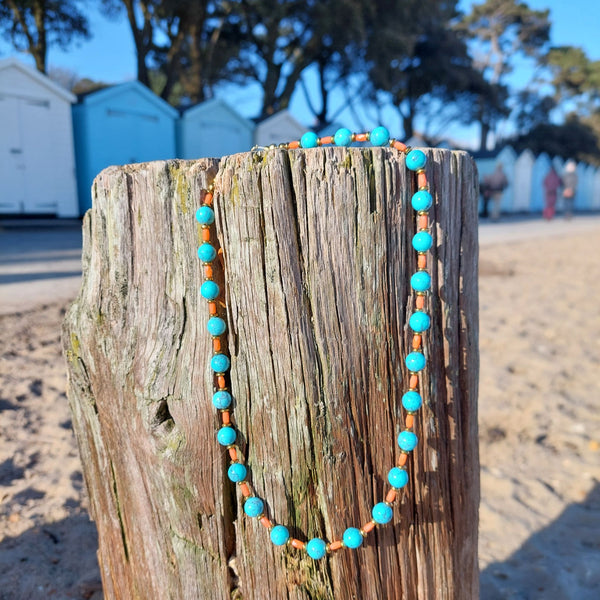 Lovely 8mm turquoise calcite beads & coral glass tubes with gold hematite discs Gold plated fastenings & lobster clasp with gold (nickel free) star charm Length - 47cm Perfect for wearing with those snuggly winter jumpers! **Presented in lovely Kraft paper gift box with reusable organza pouch**