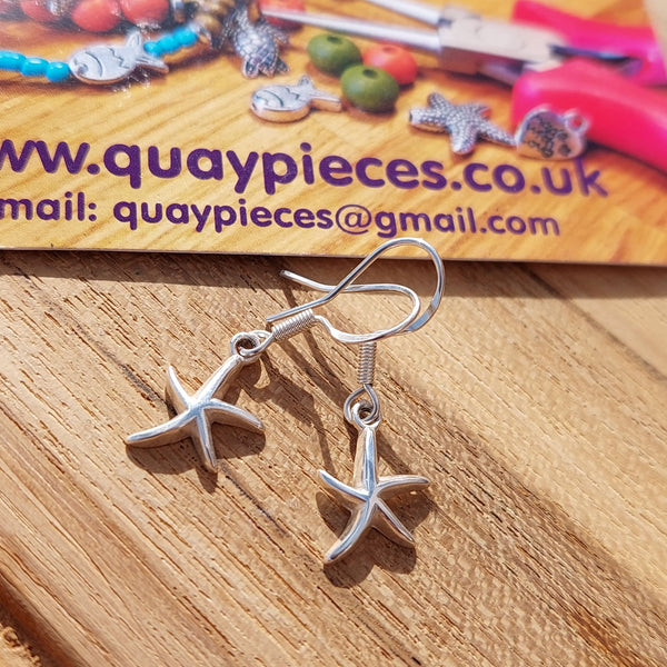 ﻿925 Hall Marked Sterling Silver  Super cute starfish earrings   H 25 mm (from top of hook)  x W 10 mm  Gorgeous little gift for sea lovers or a treat for yourself!