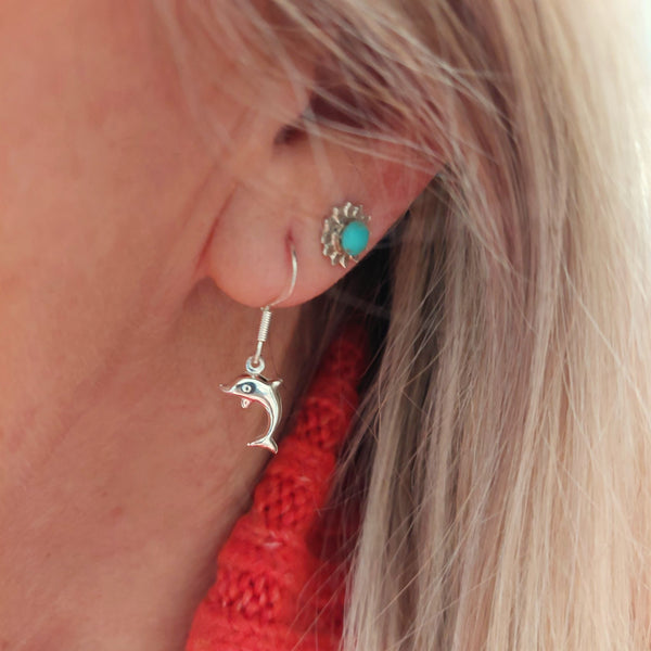 ﻿925 Hall Marked Sterling Silver  Super cute dolphin earrings  H 27 mm (from top of hook)  x W 9 mm  Gorgeous little gift for sea lovers or a treat for yourself!