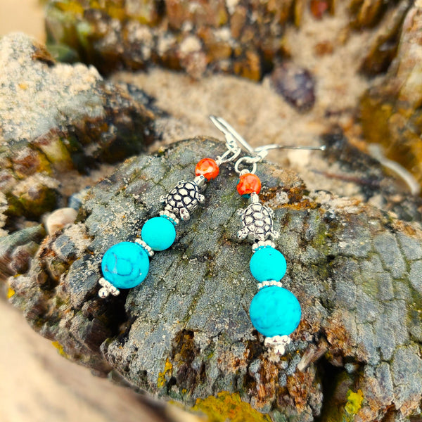 <p>Super sweet handmade&nbsp;turtle earrings with natural stone, wood beads, silver spacers &amp; cute turtle (nickel free)&nbsp;</p> <p>Available in 3 colour styles - Peach/Turquoise/Green</p> <p>925 Sterling Silver Hook</p> <p>Length 35mm from bottom of hook</p> <p>Perfect little gift for surf chicks!</p> <p><strong><em>**Presented in lovely Kraft paper gift box with reusable organza pouch**</em></strong></p> <p>&nbsp;</p>