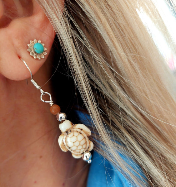 Super cute howlite turtle earrings with silver plated beads - available in 2 colours  Turquoise or Ivory  925 Sterling Silver Hook  Length 35mm from bottom of hook  Fun accessory for your Summer outfits!