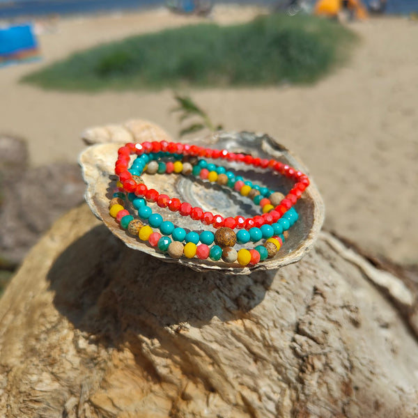 Handcrafted Collection of delicate 4mm Beaded Bracelets  Each one unique, 1) turquoise magnesite with sand colour stone beads 2) coral faceted glass beads 3) multi-colour faceted glass &amp; sand colour stone beads  Close fit elasticated, so will fit most adult wrists (measuring 7.5 in/19cm)  Add a fabulous pop of colour to your Summer outfits  **Presented in lovely Kraft paper gift box with reusable organza pouch**