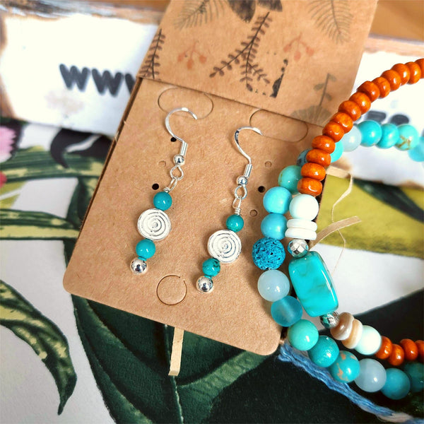 925 Hall Marked Sterling Silver

Lovely Handmade Earrings with Sterling silver beads, turquoise stone &amp; silver circle swirl wave

H 22 mm from bottom of hook

Gorgeous little gift for a friend or a treat for yourself!
