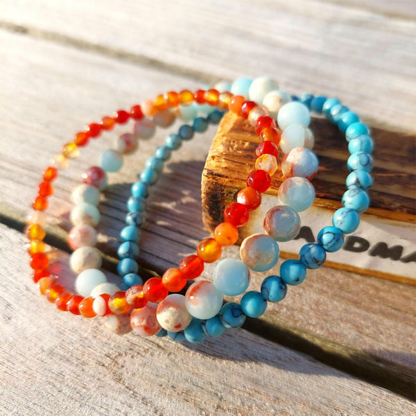 Super cool handcrafted set of 3 Beaded Bracelets

Each Bracelet is individually designed one with 4mm turquoise calcite beads, the second with&nbsp;4mm faceted amber agate beads &amp; the third with 6mm pale blue jasper beads.
A perfect Summer combination!

Elasticated, so will fit most adult wrists (measuring 7.5 in/19cm
(they are designed to fit snugly)

**Presented in lovely Kraft paper gift box with reusable organza pouch**
