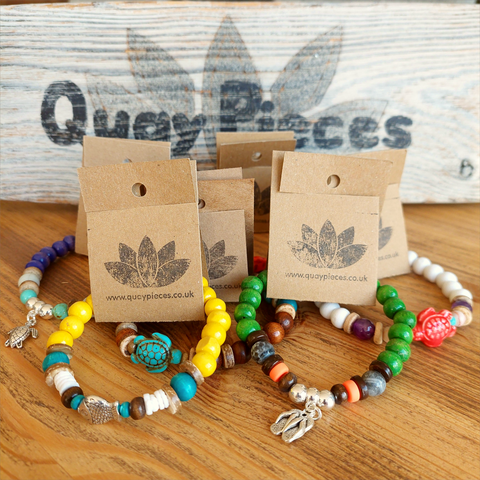 Fun sea creature bracelets, handmade with wood, ceramic &amp; stone beads, coconut discs &amp; silver plated beads charms

Elasticated, so will fit most adult wrists (measuring 7.5 in/19cm)

Each bracelet may be slightly different.

Great little gift to make someone's day or cheer up a friend!

**Presented in lovely Kraft paper gift box with reusable organza pouch**