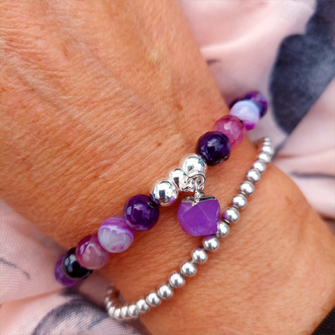 Gorgeous natural purple striped agate beads with silver plated hematite &amp; marble hexagonal charm

Each bracelet will be unique due to varying colour shades of the stone beads

Elasticated, so will fit most adult wrists (measuring 71/2 in/19cm)

**Presented in lovely Kraft paper gift box with reusable organza pouch**