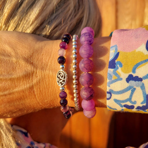 Gorgeous natural purple striped 6mm agate beads with silver plated hematite beads &amp; carved tree charm

Each bracelet will be unique due to varying colour shades of the stone beads

Elasticated, so will fit most adult wrists (measuring 71/2 in/19cm)

**Presented in lovely Kraft paper gift box with reusable organza pouch**
