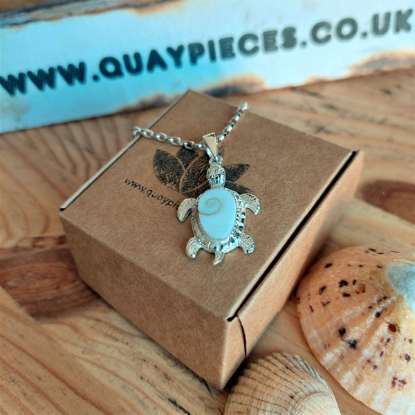 ﻿925 Hall Marked Silver Gorgeous White Turtle Pendant decorated with Shiva Shell, engraved outer edge & legs H 38 mm x W 30 mm Long 28" Sterling Silver curb chain with lobster clasp ﻿**Presented in lovely Kraft paper gift box with reusable organza pouch**