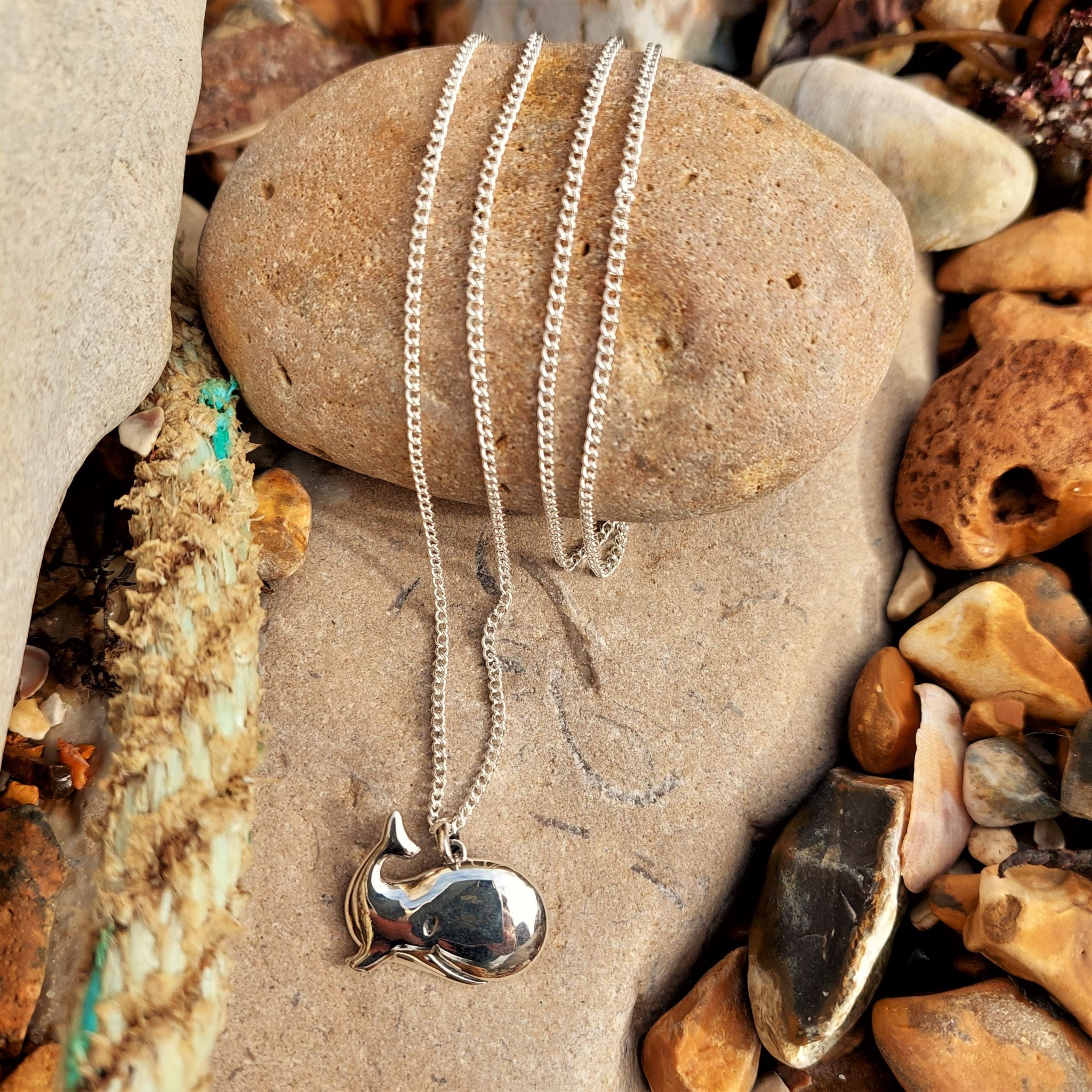 How cute is this Whale pendant?   ﻿925 Hall Marked Silver  H 21 mm x W 25 mm  Long 26" Sterling Silver curb chain with lobster clasp  Make someone's day with the super smiley Moby!   ﻿**Presented in lovely Kraft paper gift box with reusable organza pouch**  ﻿﻿