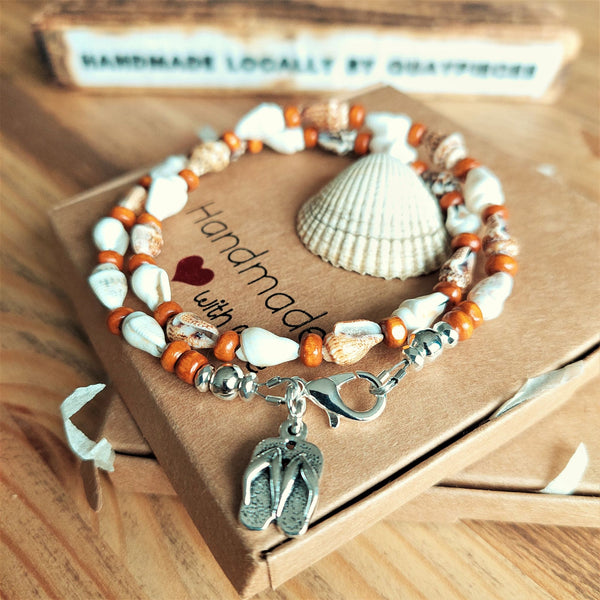 Dainty handmade natural shell, orange shell & wood beaded surf style choker necklace Approximately 10mm coconut brown spiral shells & made with love charm The necklace has sterling silver plated fastenings & lobster clasp with extension chain to adjust the length Length - 40cm extends to 44cm Cute little gift for any Surfer chick! *