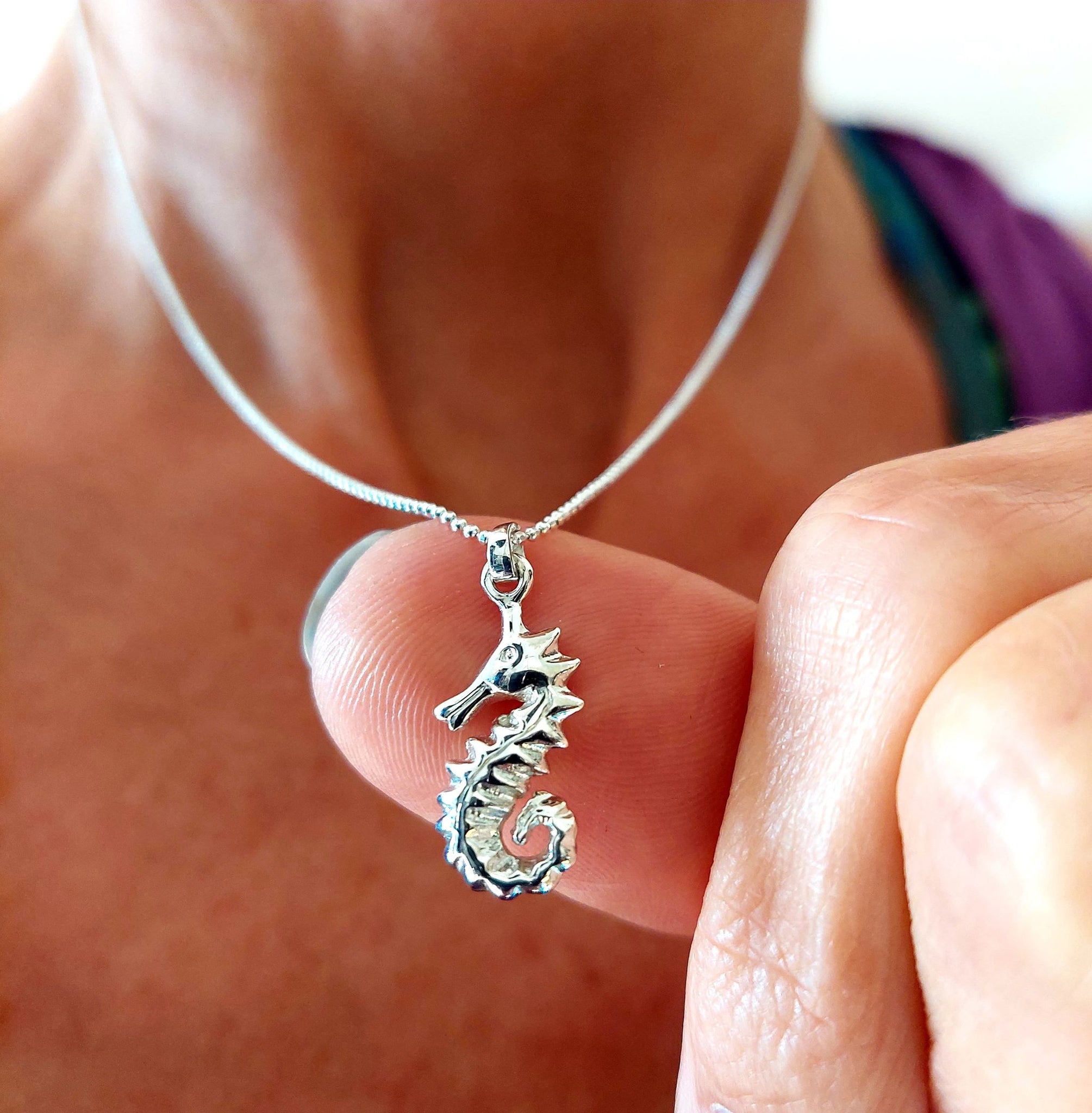 ﻿925 Hall Marked Sterling Silver  Adorable Engraved Silver Seahorse Pendant   H 20 mm x W 10 mm    18" Silver 1 mm diamond cut chain  Lovely gift for a beach buddy!   **Presented in lovely Kraft paper gift box with reusable organza pouch**