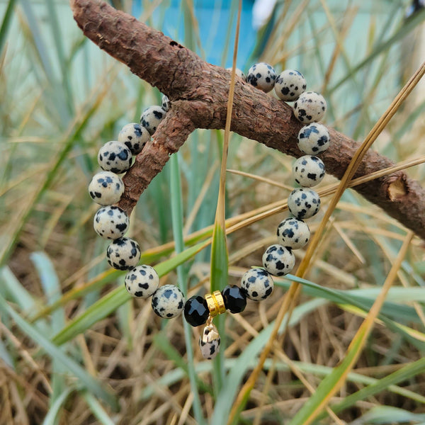 Lovely Dalamatian Jasper stone 8mm bead bracelet with gold plated charm   Elasticated, so will fit most adult wrists (measuring 71/2 in/19cm)  Perfect for wearing with those Christmas outfits & lovely gift for friends or family  **Presented in lovely Kraft paper gift box with reusable organza pouch**