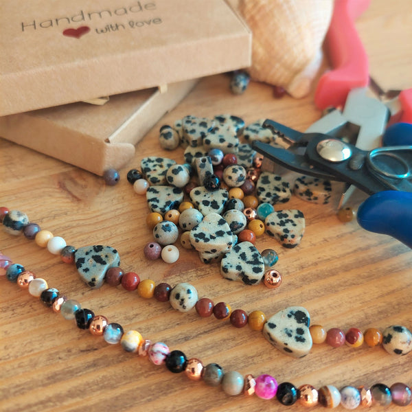 ﻿Add a bit of autumnal colour to your wardrobe with this cute necklace 4mm agate beads, gold plated hematite & dalmatian stone hearts with gold plated fastenings & star charm. Length - 42cm  Super little addition to your Winter wardrobe!  **Presented in lovely Kraft paper gift box with reusable organza pouch**