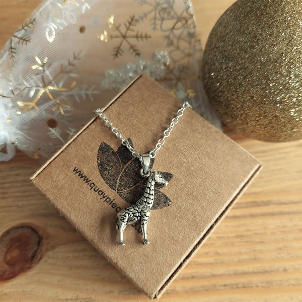 ﻿925 Hall Marked Sterling Silver  Super cute three dimensional engraved giraffe pendant   H 25 mm x W 10 mm  18" Silver 2.3mm trace chain  Gorgeous gift for any animal lover!   **Presented in lovely Kraft paper gift box with reusable organza pouch**  ﻿