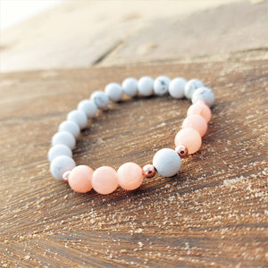 Super cute bracelet in delicate pastel colours, 8mm natural stone white & rose peach calcite beads with rose gold hematite Elasticated, so will fit most adult wrists (measuring 71/2 in/19cm) Lovely gift for friends or family **Presented in lovely Kraft paper gift box with reusable organza pouch**
