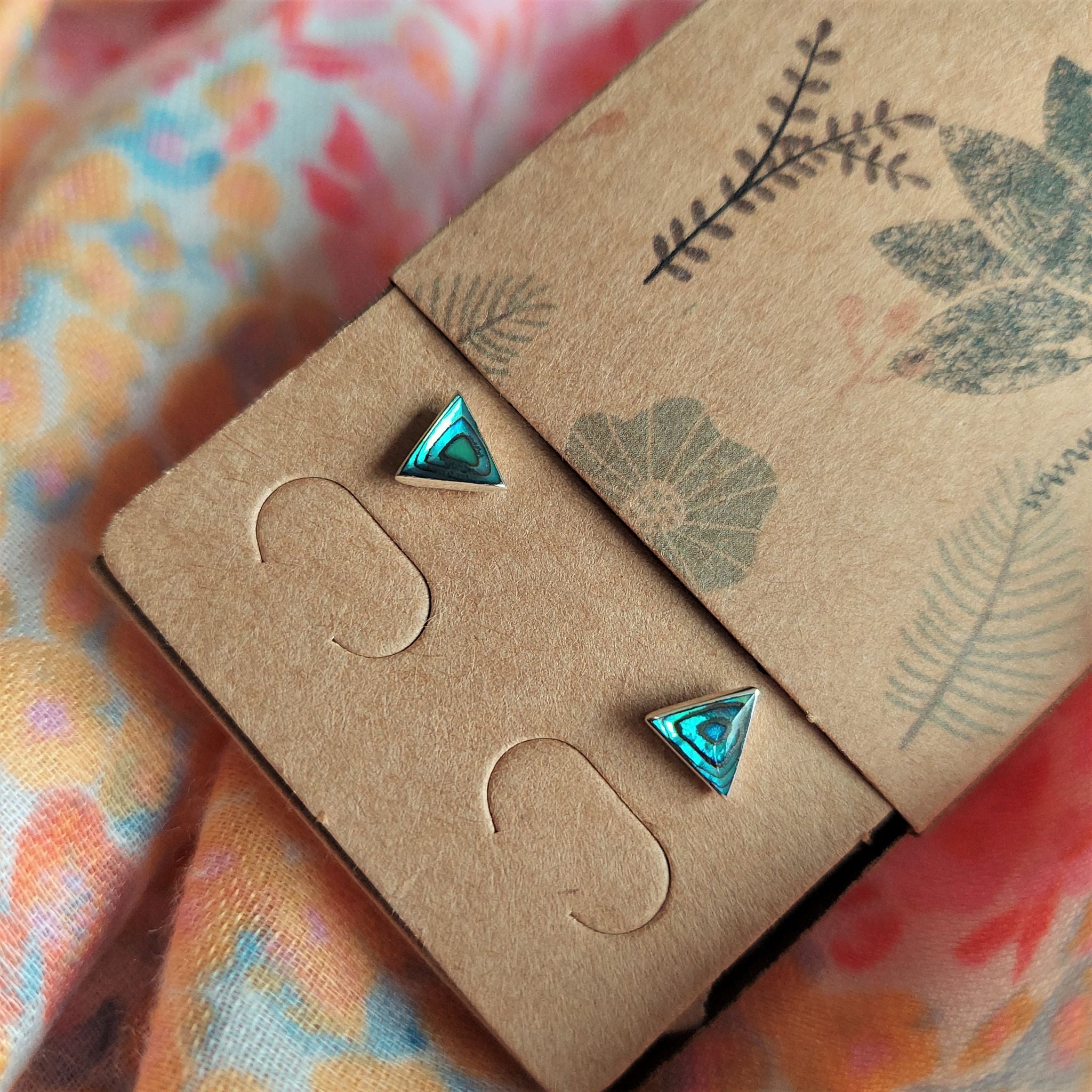 925 Hall Marked Sterling Silver  Super Cute blue/green Abalone Triangle shaped Stud Earring  H - 7mm x W - 7mm   Perfect for everyday wear!  **Presented in lovely Kraft paper gift box with reusable organza pouch**