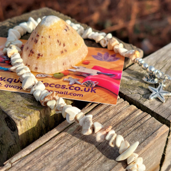 Super cool surf choker, handmade with natural stone chip & silver plated hematite beads with star charm Silver plated fastenings & clasp with silver (nickel free) 'made with love' heart length 40cm Fabulous vibrant necklace to wear with all your favourite outfits! Gift wrapped & presented in a pretty organza pouch **To keep your quaypieces looking great, always take me off before showering or swimming**
