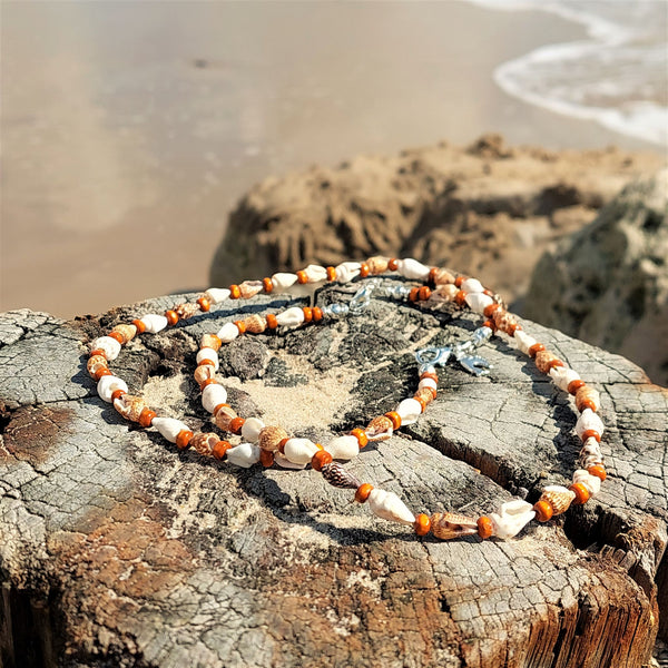 Super cute beach anklets, handmade with spiral shells & turquoise or burnt orange beads  Each anklet has sterling silver plated fastenings, lobster clasp & starfish (nickel free) charm  Length - 24cm extends   Perfect gift for any surf chick!  **Presented in lovely Kraft paper gift box with reusable organza pouch**