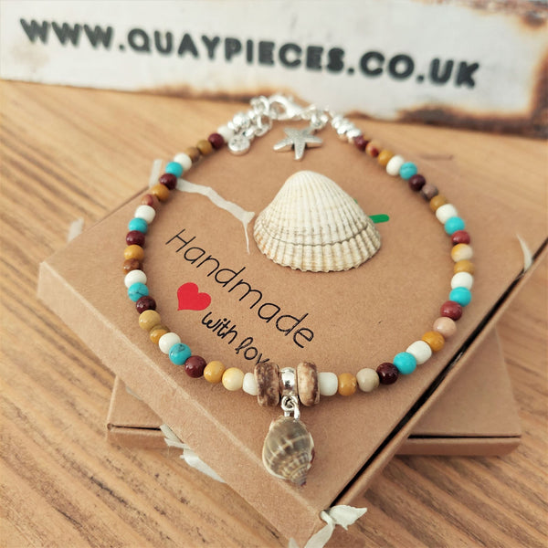 Super cute beach anklet, handmade with natural stone quartz beads & sea shell  Each anklet has sterling silver plated fastenings, lobster clasp & starfish (nickel free) charm  Length - 24cm extends to 27cm  Perfect gift for any surf chick!  **Presented in lovely Kraft paper gift box with reusable organza pouch**