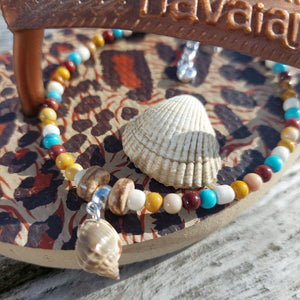 Super cute beach anklet, handmade with natural stone quartz beads & sea shell  Each anklet has sterling silver plated fastenings, lobster clasp & starfish (nickel free) charm  Length - 24cm extends to 27cm  Perfect gift for any surf chick!  **Presented in lovely Kraft paper gift box with reusable organza pouch**